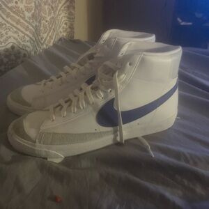 Nike White High-Top Sneakers with Blue Swoosh